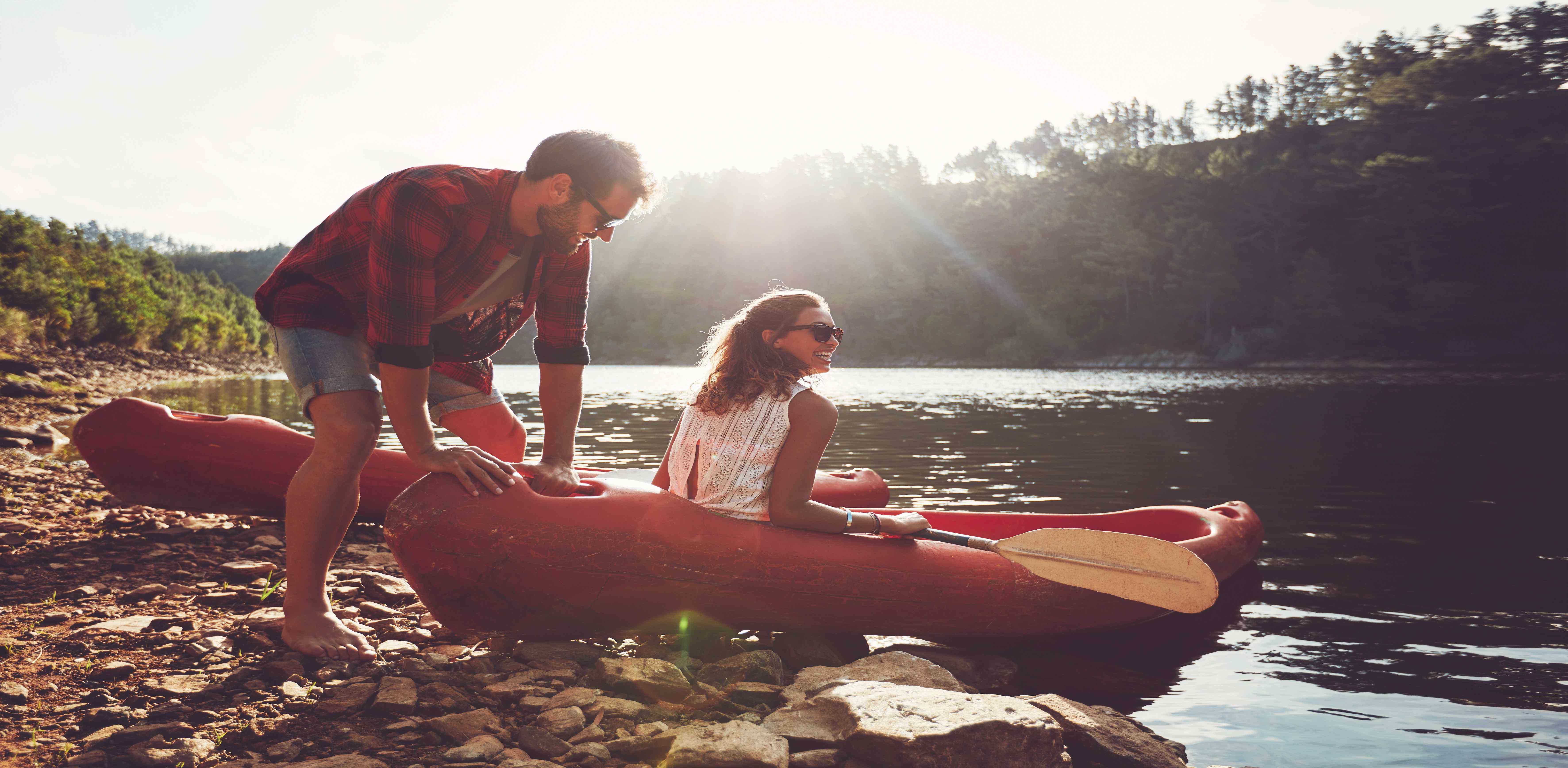 A couple by a lake