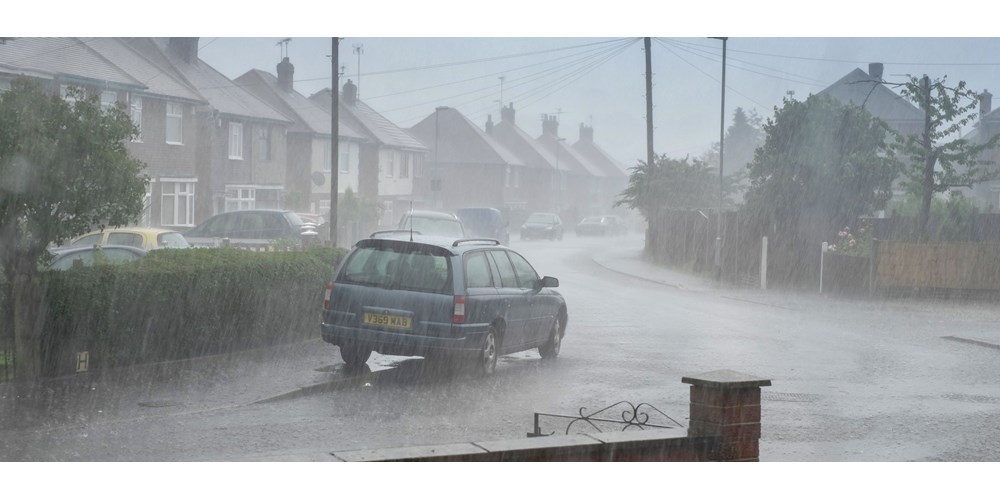 Car in a rainy road