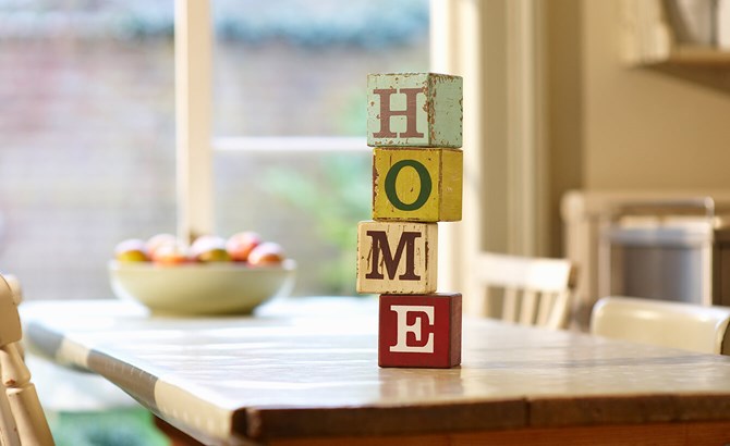 Building blocks spelling out the word home