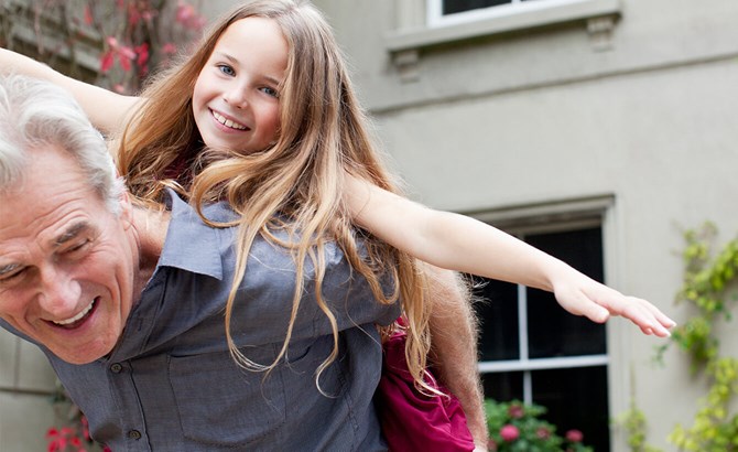 A man giving a girl a piggyback