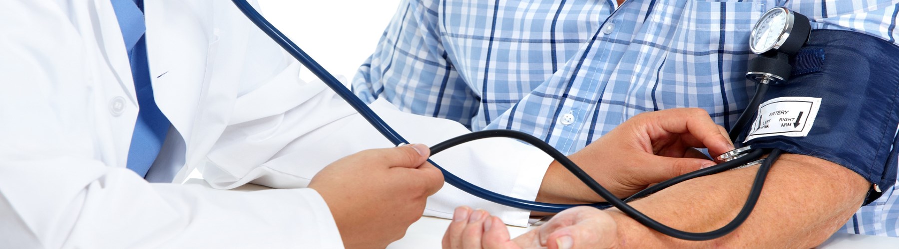 doctor checking male patients blood pressure 