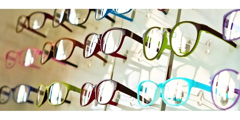 Variety of coloured glasses in opticians 