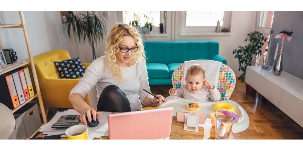 Mum working from home with baby