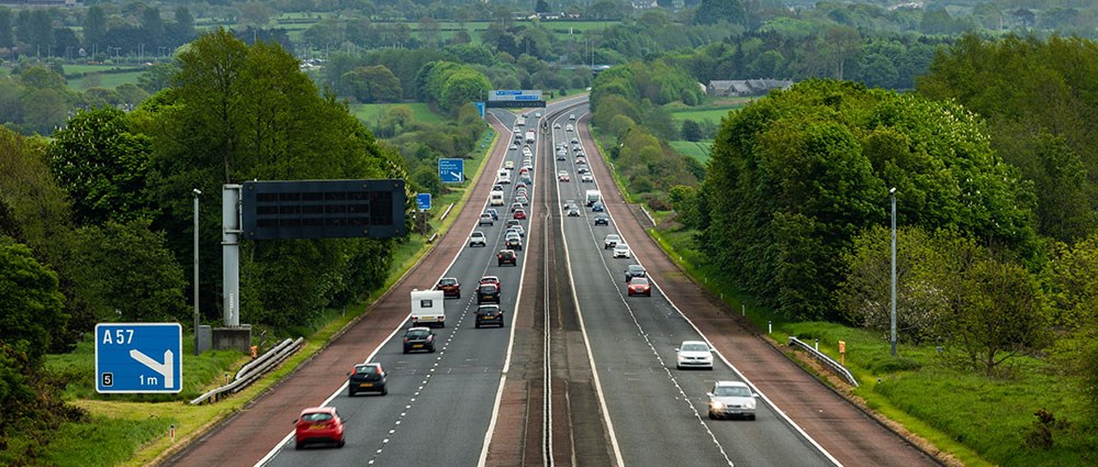 Cars driving along a motorway