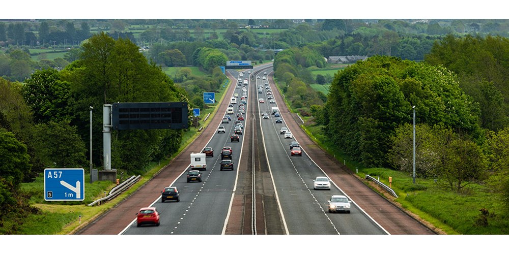 Cars driving along a motorway
