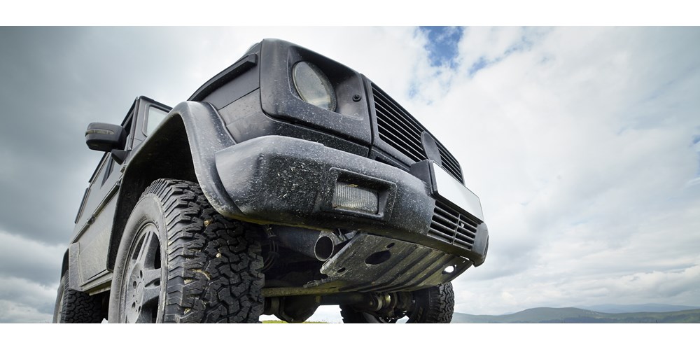 Close up image of black 4x4 car