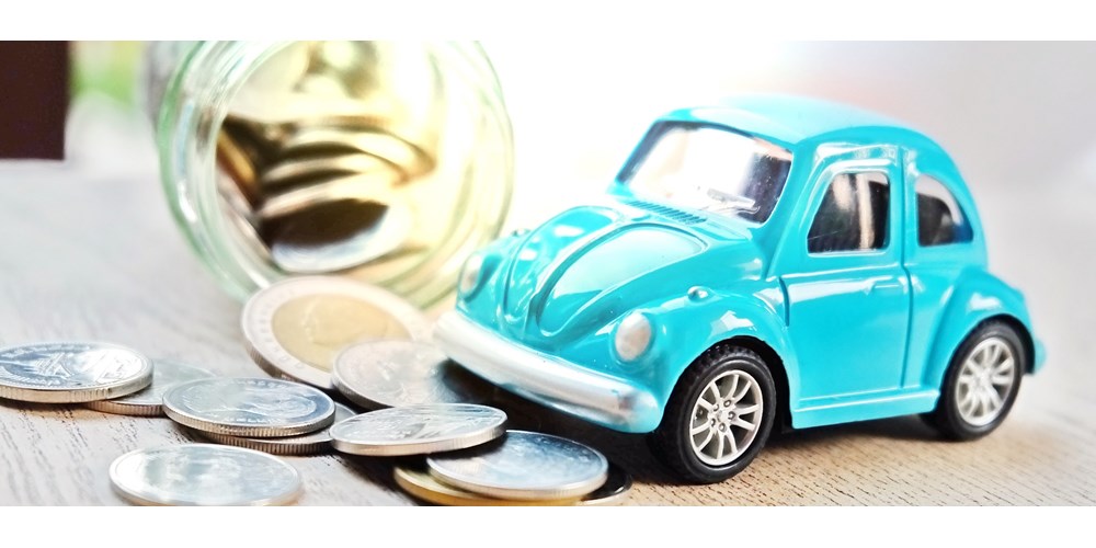 Blue toy beetle car and coin jar 