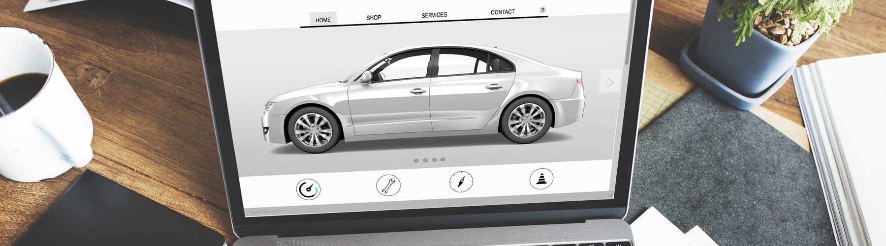 Image of silver car on laptop screen 