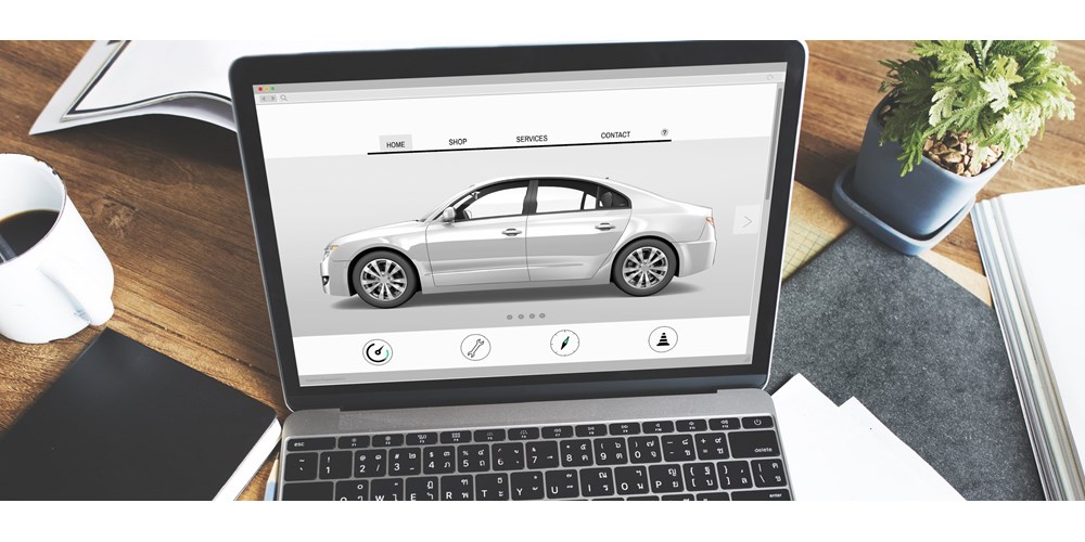 Image of silver car on laptop screen 