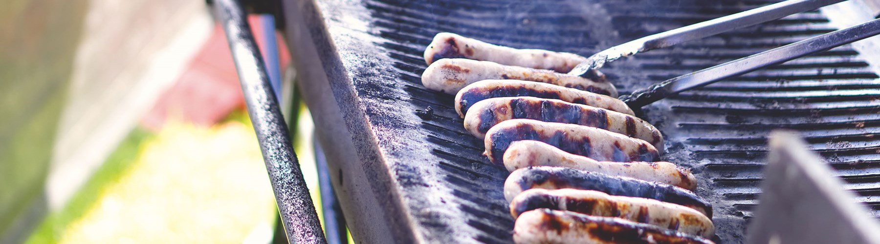 sausages on BBQ in the Summer