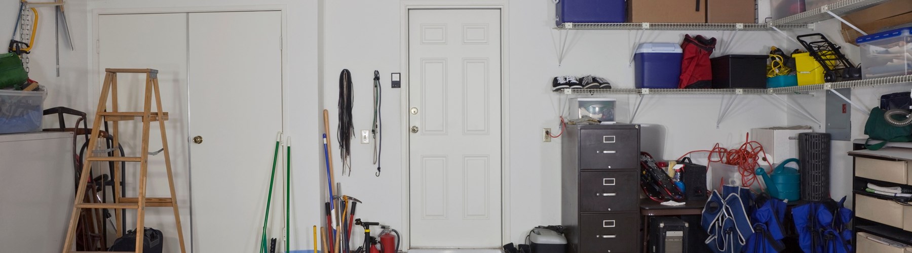 Garage interior filled with household items 