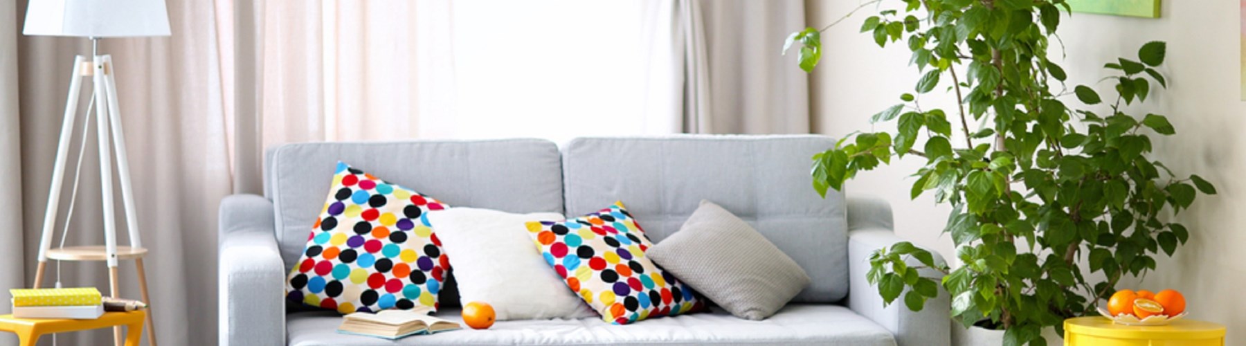 Light grey sofa in living room 