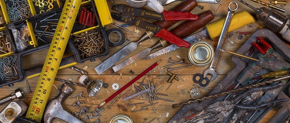 Wooden floor covered with DIY tools