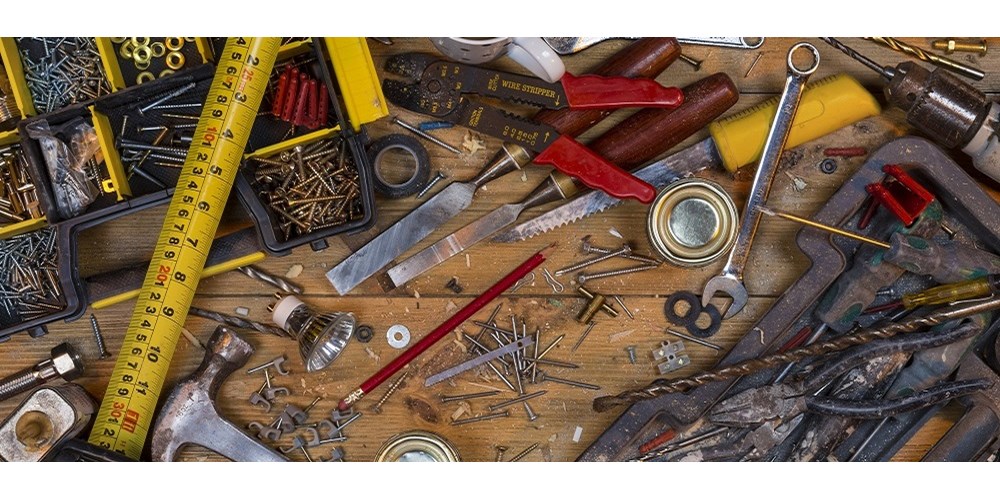 Wooden floor covered with DIY tools