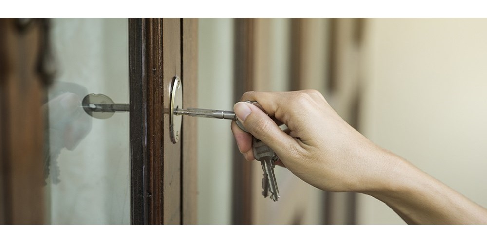 A door being unlocked with silver key