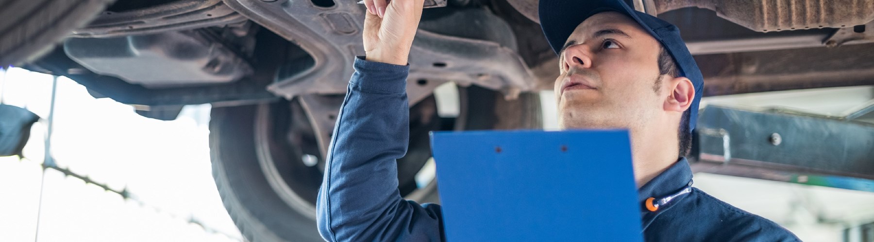 Mechanic checking a car