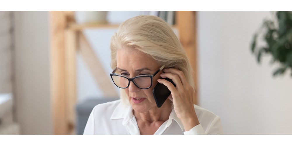 Older lady speaking on the phone