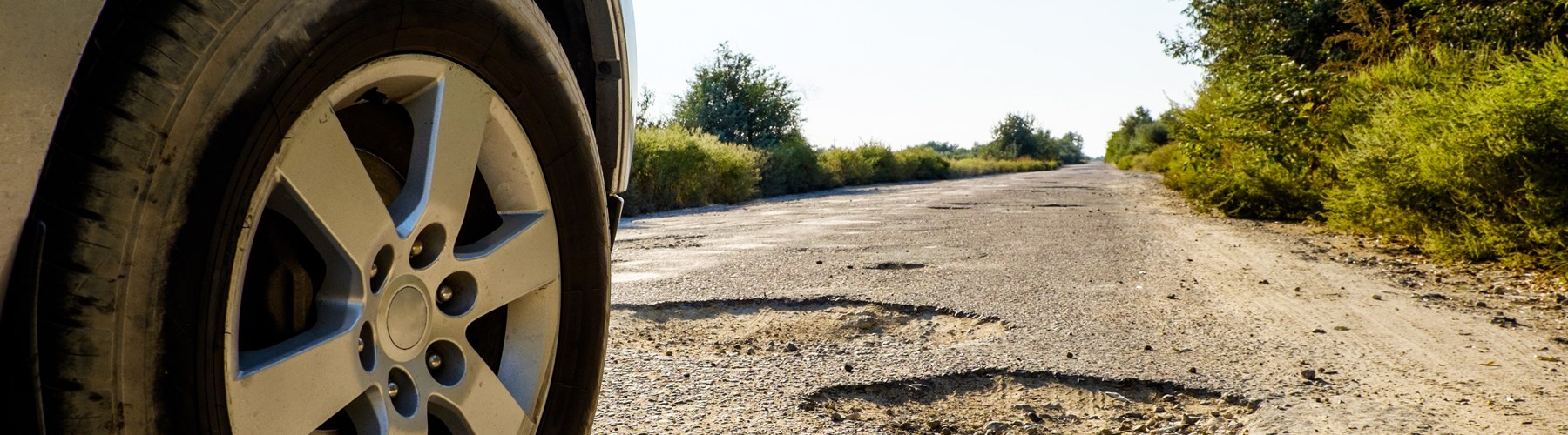 pothole on country road 