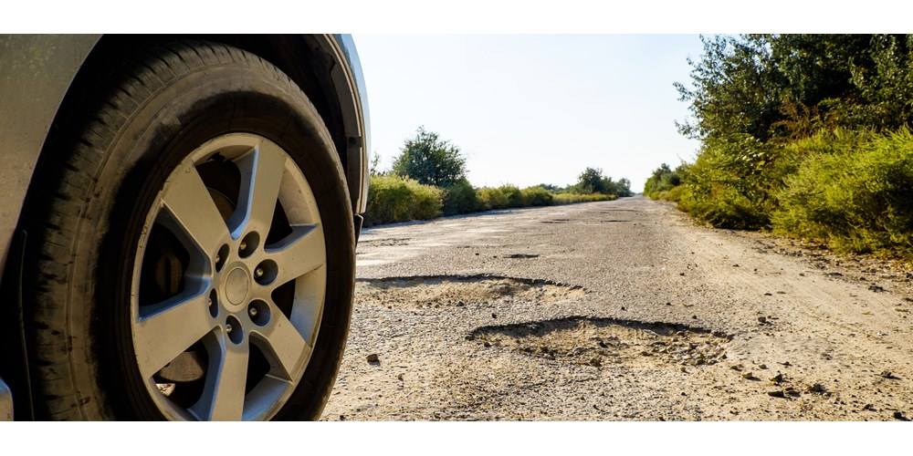 pothole on country road 