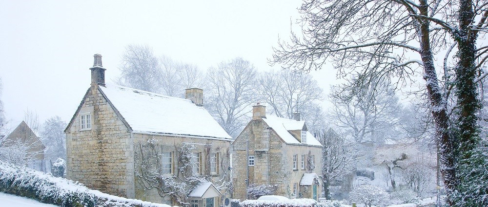 Snow covered houses in the winter 