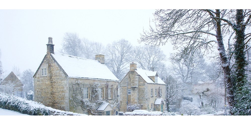 Snow covered houses in the winter 