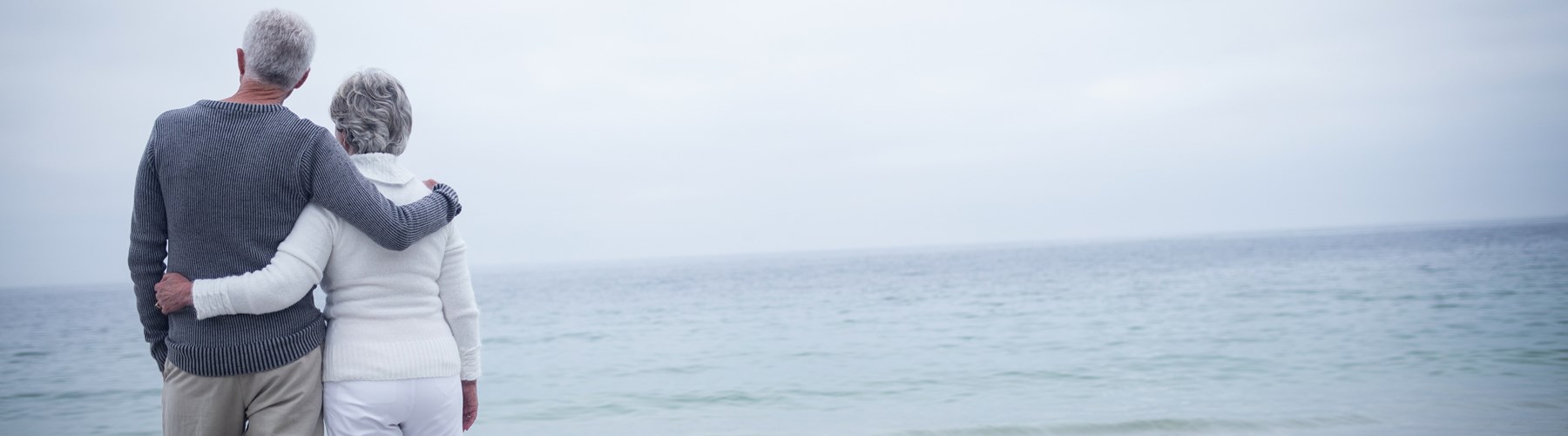 Retired couple on the beach