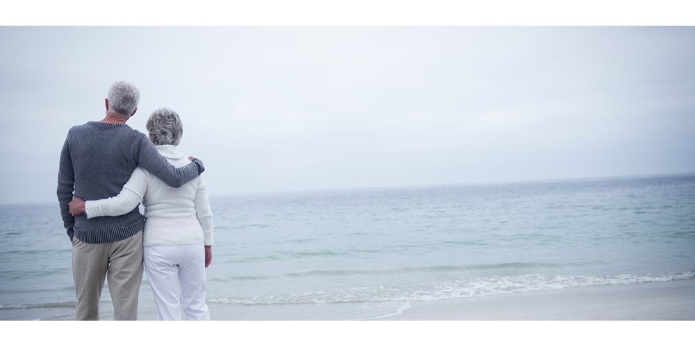 Retired couple on the beach