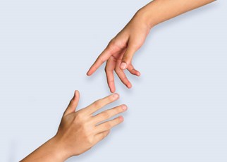 two hands nearly touching