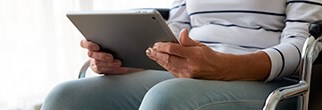 Woman sitting with laptop